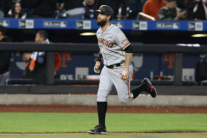 Brandon Belt rounds the bases.